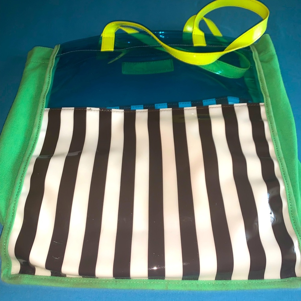 Beautiful Henri Bendel Brown and White-Striped Tote Bag with Yellow Handles.
